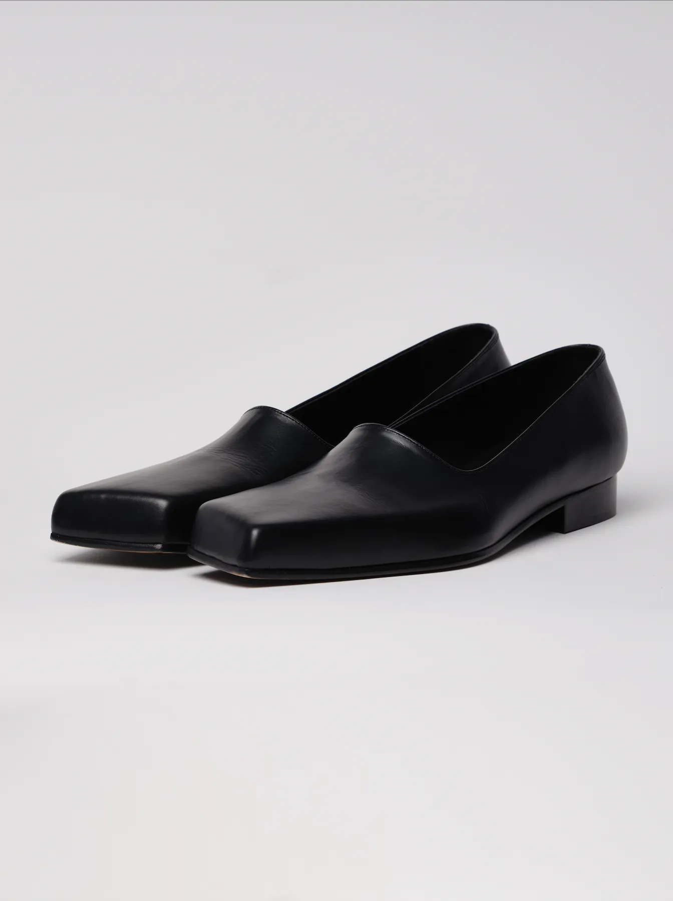 black slashed loafers
